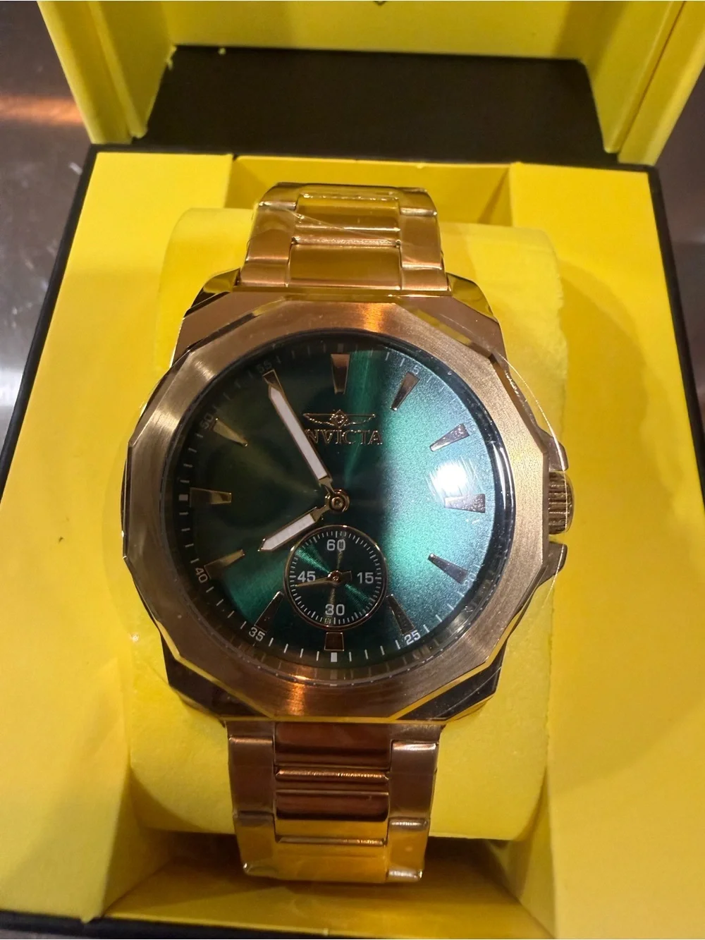 Invicta Gold Tone Watch with Blue-Green Dial